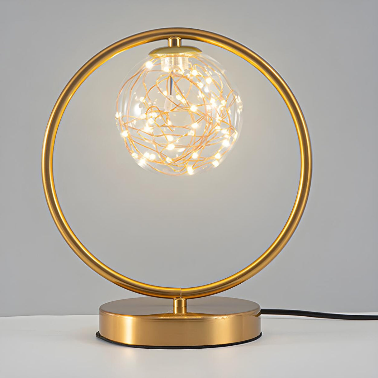 Stylish Golden Globe Glass Ring Bedside Table Lamp Image - 3