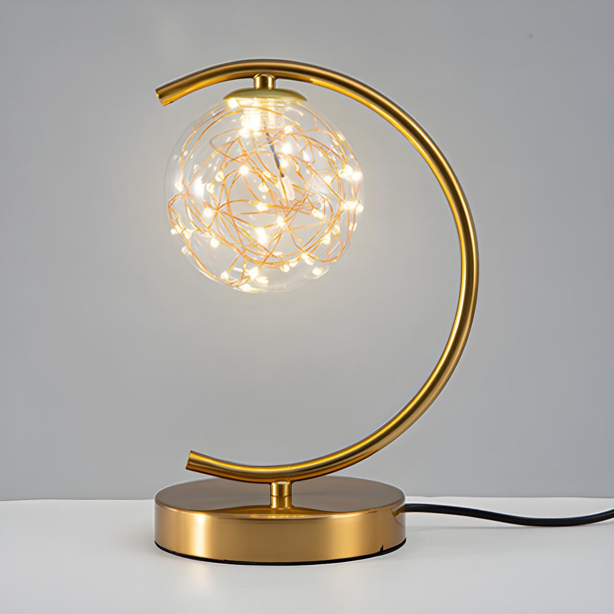 Stylish Golden Globe Glass Ring Bedside Table Lamp Image - 5