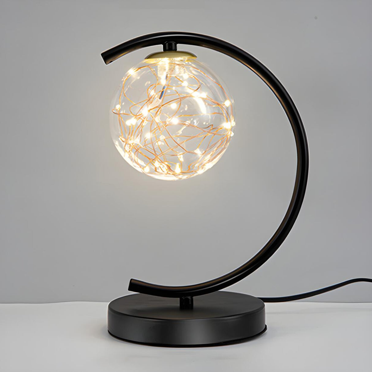 Stylish Golden Globe Glass Ring Bedside Table Lamp Image - 9