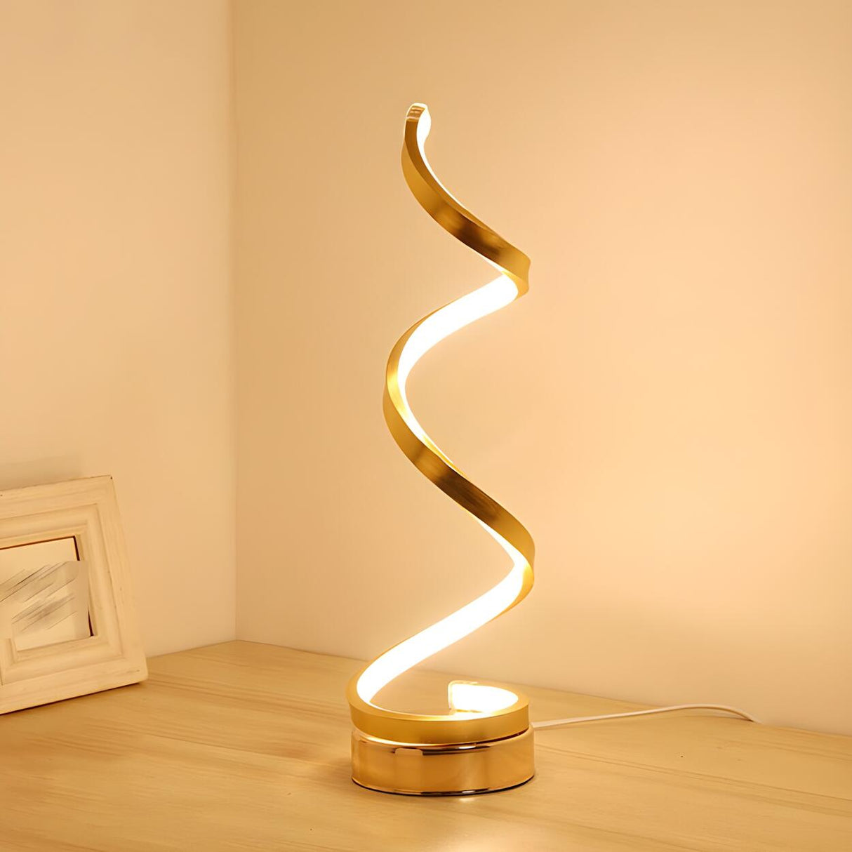 Stylish Golden Minimalist Spiral Strip LED Table Lamp Image - 1