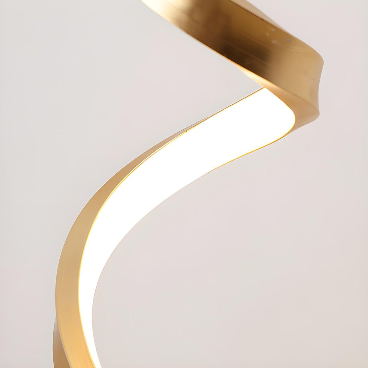 Stylish Golden Minimalist Spiral Strip LED Table Lamp Image - 17