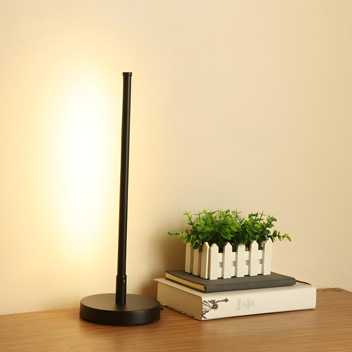 Stylish Minimalist Black Linear Oval LED Table Lamp Image - 4