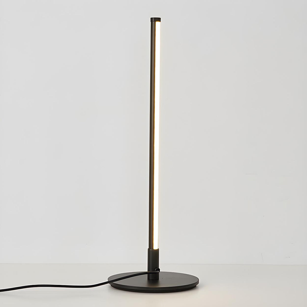 Stylish Minimalist Black Linear Oval LED Table Lamp Image - 8