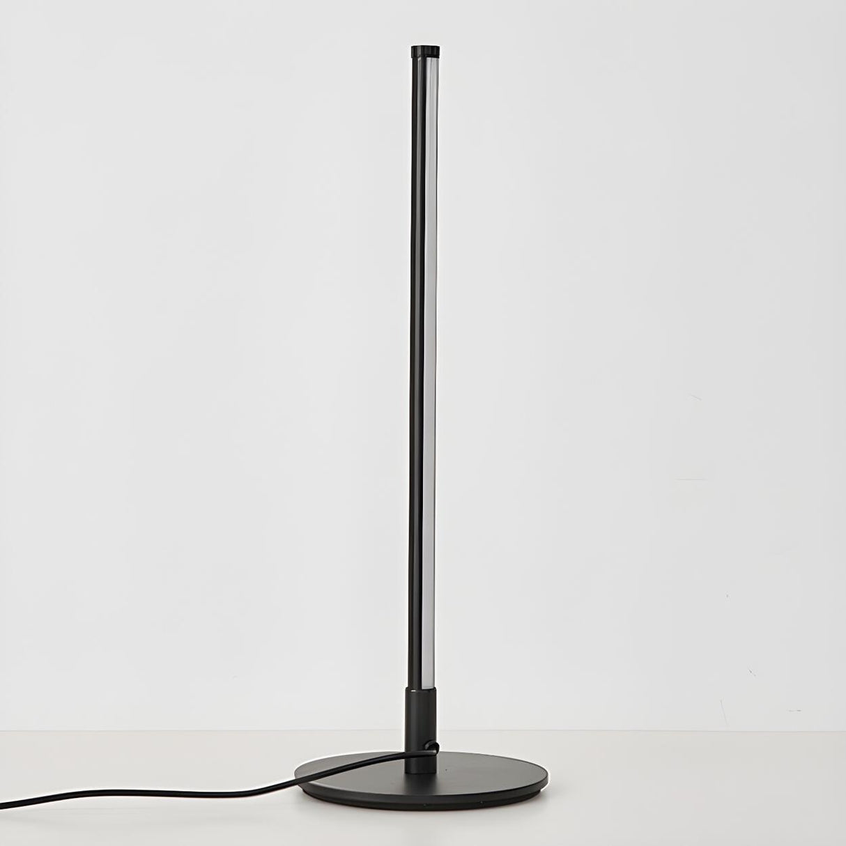 Stylish Minimalist Black Linear Oval LED Table Lamp Image - 9