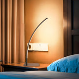 Stylish Minimalist Curved Linear Metal Table Lamp Image - 1