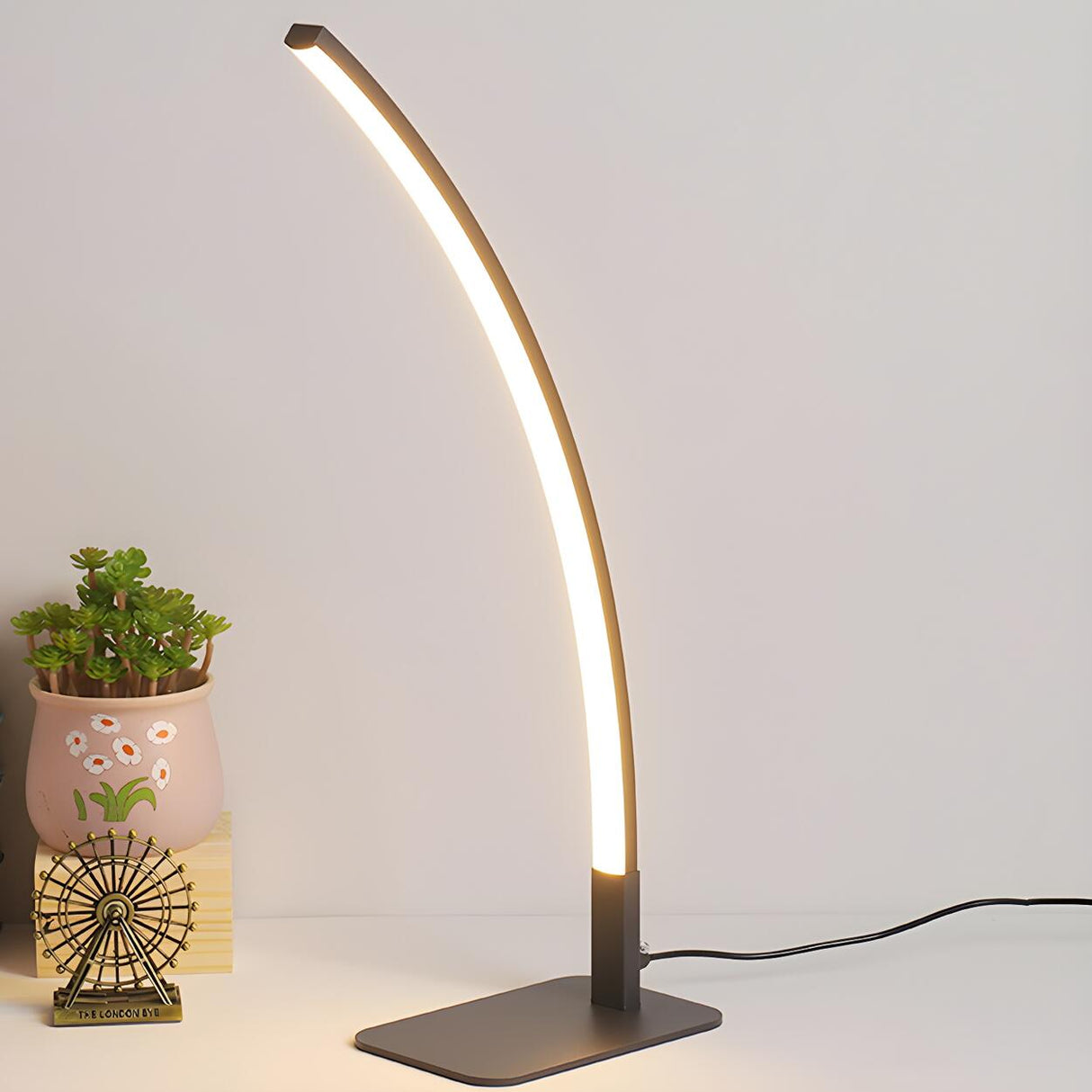 Stylish Minimalist Curved Linear Metal Table Lamp Image - 14