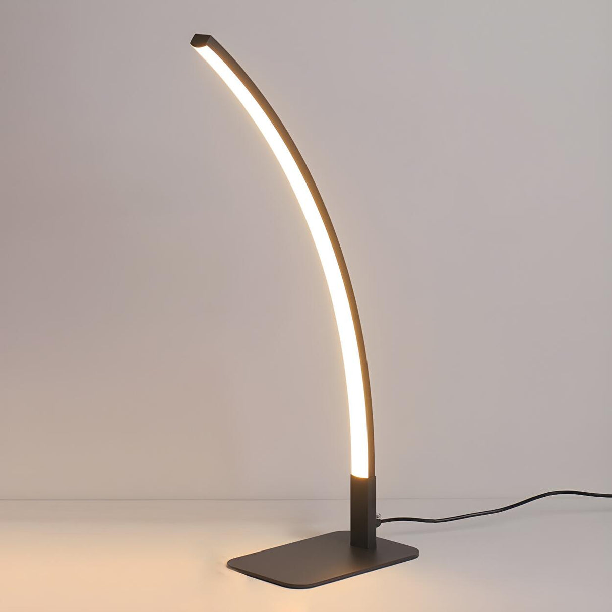 Stylish Minimalist Curved Linear Metal Table Lamp Image - 8