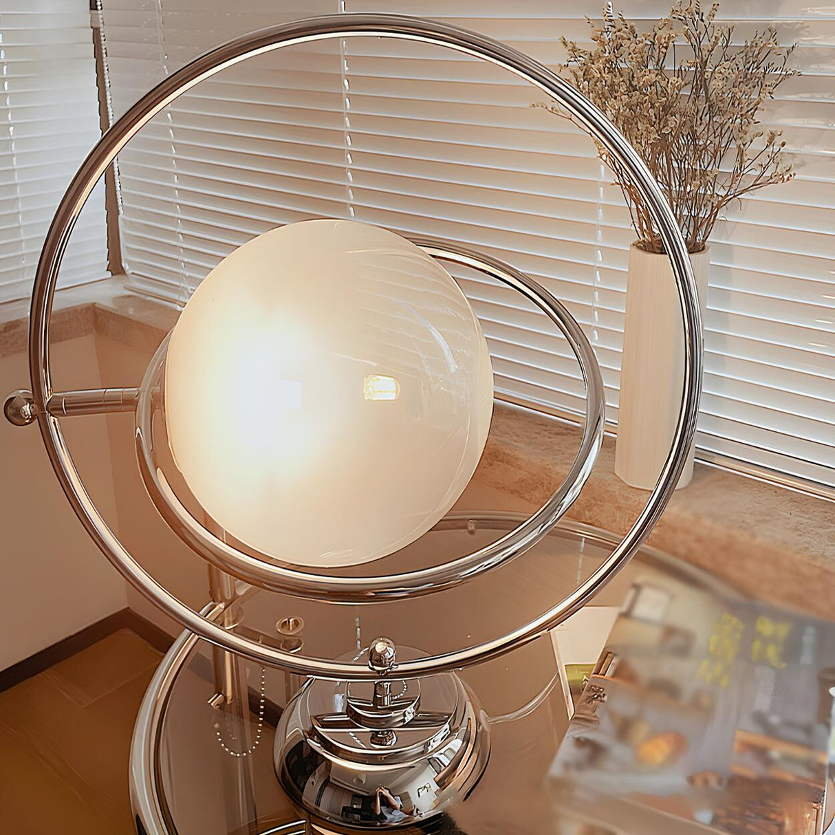 Stylish Silver Round Rotating Moon Metal Table Lamp Image - 8