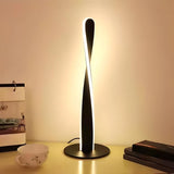 Stylish Simple Twisted Metal LED Bedside Table Lamp Image - 1