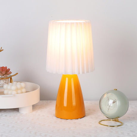 Stylish Yellow Tapered Base Pillar Shade Table Lamp Image - 1