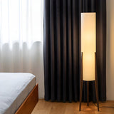 Trendy Modern Cylindrical Shade Tripod Floor Lamp Image - 1