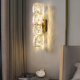 Trendy Multi-Faceted Gold Crystal Bedroom Wall Lamp Image - 1