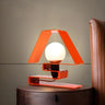 Unique Orange Geometric Ball Shade Metal Table Lamp Image - 1