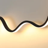 Unique Outdoor Black Linear LED Wave Wall Sconce Image - 13