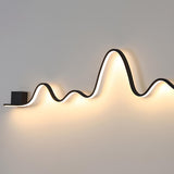 Unique Outdoor Black Linear LED Wave Wall Sconce Image - 9