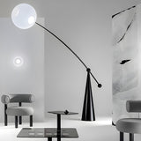 Unique Spherical Shade and Arched Metal Floor Lamp Image - 1