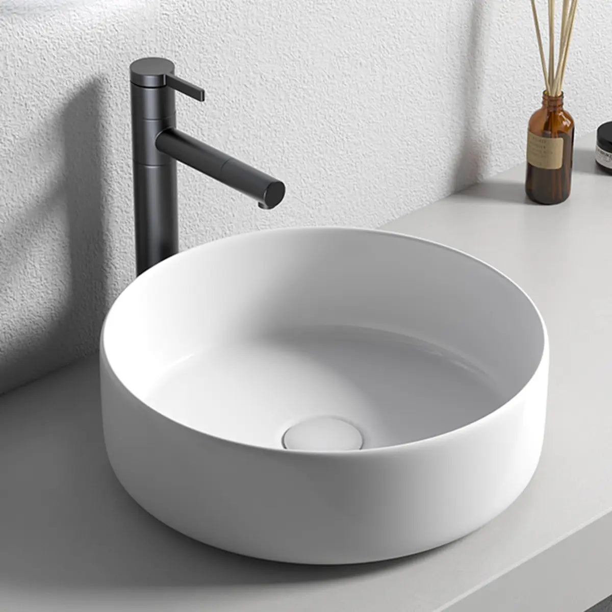 White Ceramic Center Trapway Circular Bowl Sink Image - 1