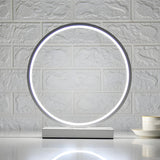 White Minimalism Circular LED Metal Frame Table Lamp Image - 4