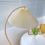 White Minimalist Curved Floor Lamp with Pleated Shade Image - 9