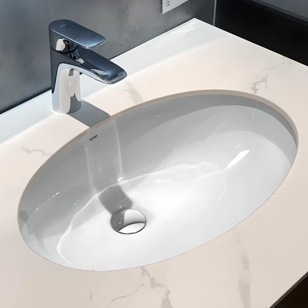 White Oval-Shaped Ceramic Undermount Bathroom Sink Image - 1