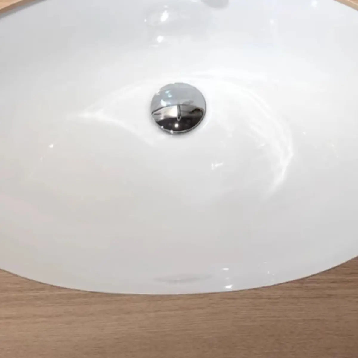 White Oval-Shaped Ceramic Undermount Bathroom Sink Image - 12