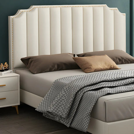 White Upholstered Stepped Headboard with Nailhead Trim Image - 1